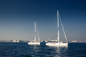 Fototapeta premium Sailing ship yachts with white sails
