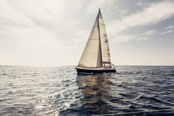 Sailing ship yachts with white sails