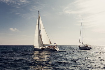 Naklejka na ściany i meble Sailing ship yachts with white sails