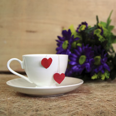 Cup of tea with heart teabag