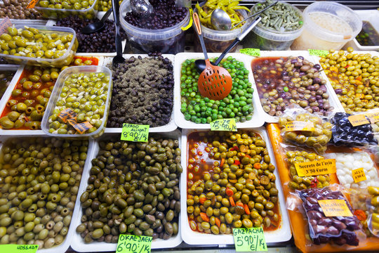 Various marinated olives in cans