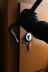 Burglar breaking the safe