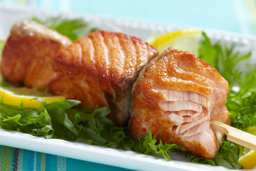 Delicious roasted salmon on skewers