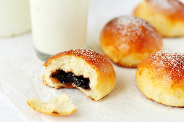 Delicious gooseberry jam buns with milk