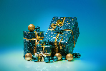 Gift boxes and christmas balls,Isolated on blue background