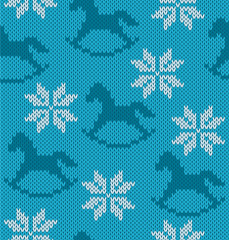 Knitted background with image of snowflakes and horses