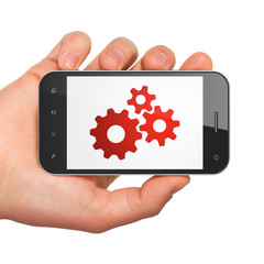 Data concept: Gears on smartphone