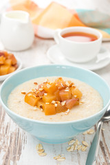 oatmeal with caramelized peaches, close-up