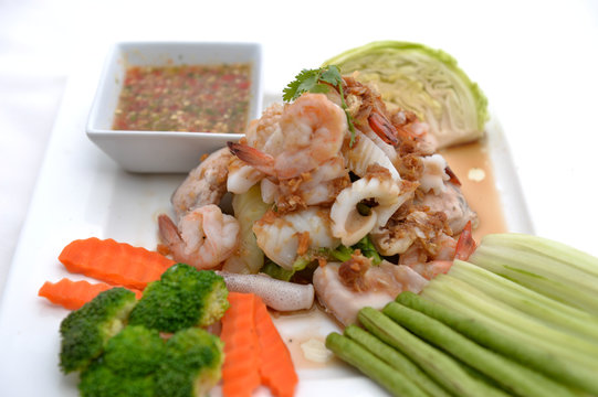 fried king prawns and squid with garlic and herbs