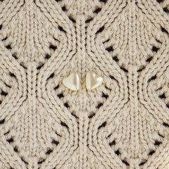 Two small pearl hearts