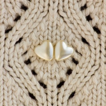 Two pearl hearts