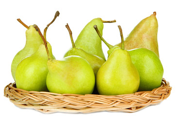 Pears  on wicker mat, isolated on white