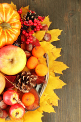 Naklejka na ściany i meble Beautiful autumn composition, on wooden background