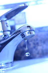 Ceramic sink with chrome fixture, close up