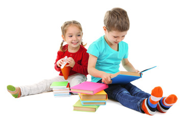 Little children with books isolated on white