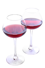 Wineglasses with red wine, isolated on white