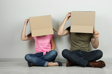 Couple with cardboard boxes