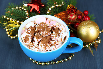 Hot chocolate with cream in color mug,