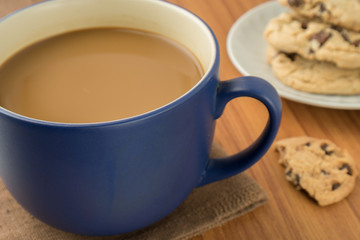 A mug of coffee and chocolate chip cookies