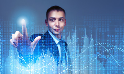 Young businessman touching icon