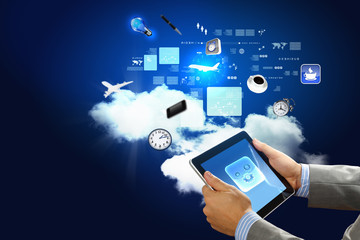 Close-up of hands holding tablet pc