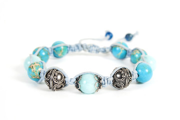 Popular Buddhist bracelet shamballa on a white background.