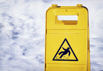 caution slippery surface sign