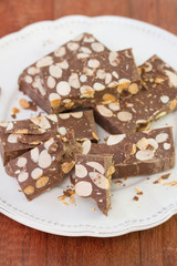 sweets with almond on plate