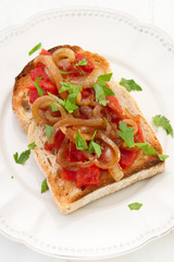 toast with tomato, onion and parsley
