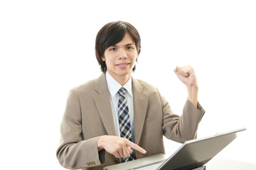 ガッツポーズのビジネスマン