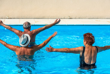 Active seniors getting a workout at the swimming pool