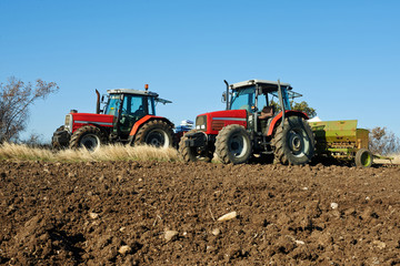 Fototapeta premium agricultural tractor sowing seeds