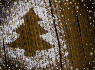 Tree shape made of sugar on wooden background