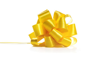 Festive yellow bow on white background