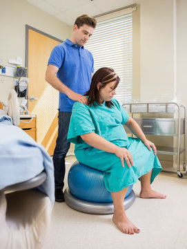 Pregnat Woman in Hosptail Using Exercise Ball