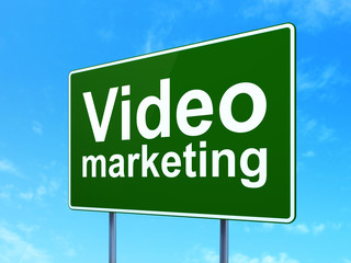 Business concept: Video Marketing on road sign background