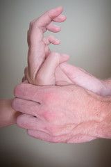 Fototapeta premium Chiropractor massage hand with pressure