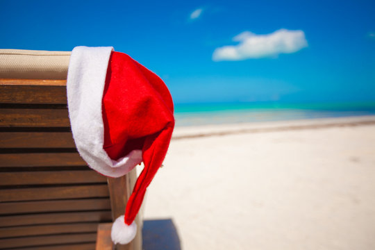 Close-up Of Santa Hat On Chair Longue At Tropical Caribbean