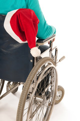Obraz premium Person in wheelchair with Christmas