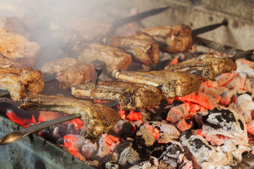 Appetizing steaks prepared on a grill wood coal, outdoor