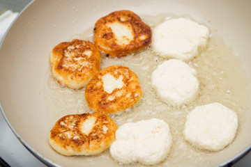 Fototapeta na wymiar pancakes are fried in a pan