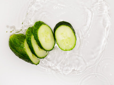 Cucumber In The Water On A White Background