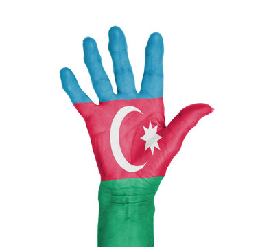 Palm of a woman hand, painted with flag