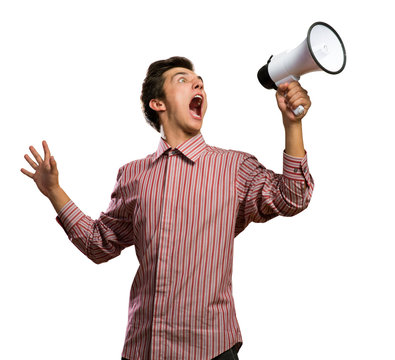 Portrait of a young man shouting using megaphone