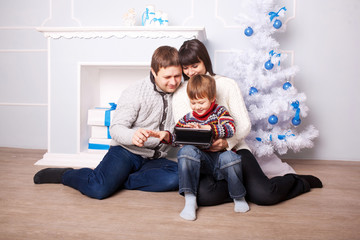 Funny family using the tablet