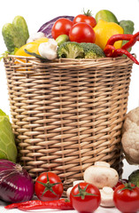 Fruits and vegetables in the basket close up