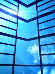 blue sky through glass roof
