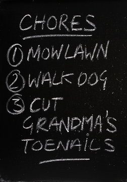 Chores List Written On A Blackboard