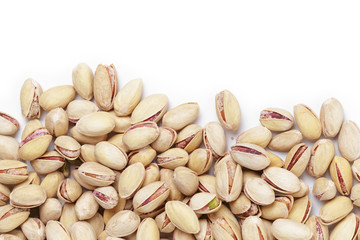 border from roasted salty pistachios nuts