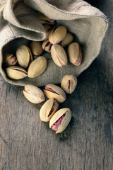roasted and salted pistachios pour out of the bag